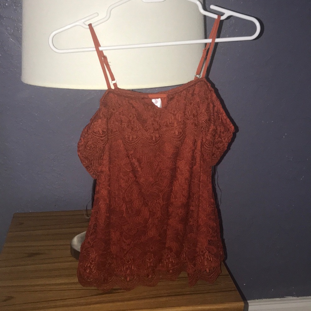 Shirt without sleeve. Gorgeous! Never worn